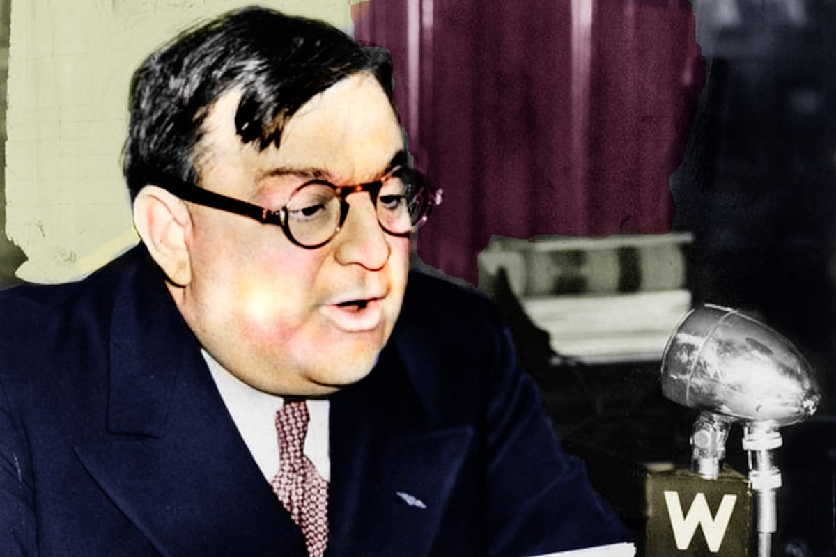 New York City Mayor Fiorello LaGuardia, with eyeglasses and short, dark hair reads off a paper into a 1930s microphone for radio broadcast. It is colorized from a black-and-white photograph.
